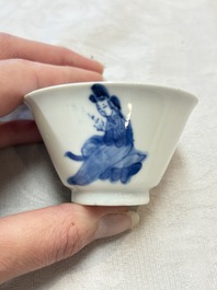 Five Chinese blue and white 'elegant beauty and boy' cups and saucers, Chenghua mark, Kangxi