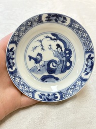 Five Chinese blue and white 'elegant beauty and boy' cups and saucers, Chenghua mark, Kangxi
