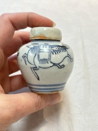 A pair of Chinese white-glazed vases and a pair of blue and white covered jars, Wanli mark and of the period