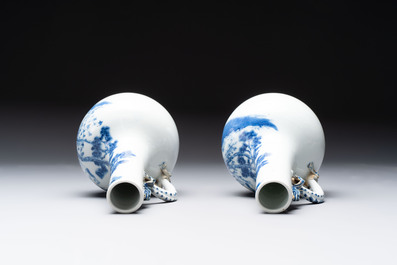 A pair of Chinese blue and white wine jugs with a chilong-form handle, possibly for the Vietnamese market, 19th C.