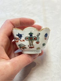 A Chinese famille rose 'tobacco leaf' vase, a pseudo-armorial cup and a famille verte cup, Kangxi/Qianlong