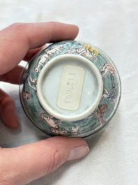 A fine Chinese famille rose 'apple pickers' cup and saucer, Yongzheng