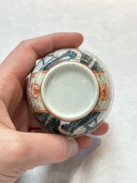 A Chinese gilt-decorated grisaille semi-erotic 'European subject' cup and saucer, Qianlong, ca. 1755
