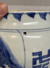 A Chinese blue and white 'qilin' jar and wooden cover, Transitional period