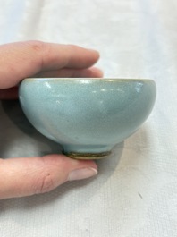 A small Chinese blue-glazed 'jun' tea cup with a wooden box, Song/Yuan