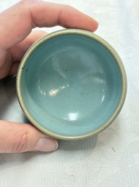 A small Chinese blue-glazed 'jun' tea cup with a wooden box, Song/Yuan