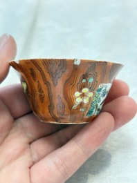 A Chinese famille rose blue-ground cup and saucer, and a 'faux-bois' cup and saucer, Yongzheng/Qianlong