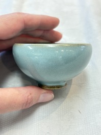 A small Chinese blue-glazed 'jun' tea cup with a wooden box, Song/Yuan