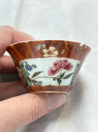 A Chinese famille rose blue-ground cup and saucer, and a 'faux-bois' cup and saucer, Yongzheng/Qianlong