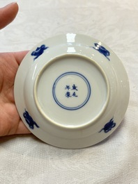 Five Chinese blue and white 'elegant beauty and boy' cups and saucers, Chenghua mark, Kangxi