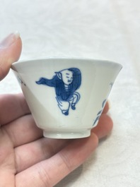 Five Chinese blue and white 'elegant beauty and boy' cups and saucers, Chenghua mark, Kangxi