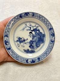 Five Chinese blue and white 'elegant beauty and boy' cups and saucers, Chenghua mark, Kangxi
