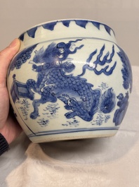 A Chinese blue and white 'qilin' jar and wooden cover, Transitional period