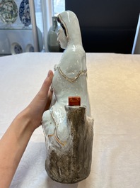 A Chinese gilt- and iron-red-decorated white-glazed figure of Guanyin, Cai Yongxin 蔡永新造 mark, 20th C.