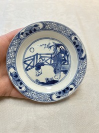 Five Chinese blue and white 'elegant beauty and boy' cups and saucers, Chenghua mark, Kangxi