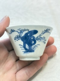 Five Chinese blue and white 'elegant beauty and boy' cups and saucers, Chenghua mark, Kangxi