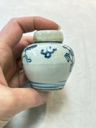 A pair of Chinese white-glazed vases and a pair of blue and white covered jars, Wanli mark and of the period