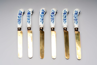 A set of six knives with Chinese gilt and blue-enamelled porcelain handles, in a case, Qianlong