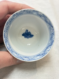 Five Chinese blue and white 'elegant beauty and boy' cups and saucers, Chenghua mark, Kangxi