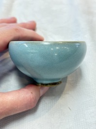 A small Chinese blue-glazed 'jun' tea cup with a wooden box, Song/Yuan