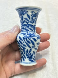 Four Chinese blue and white miniature vases, one with cover, Kangxi