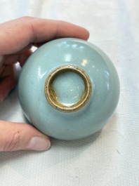 A small Chinese blue-glazed 'jun' tea cup with a wooden box, Song/Yuan