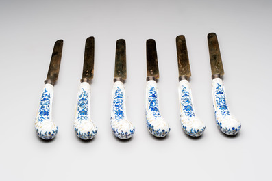 A set of six knives with Chinese gilt and blue-enamelled porcelain handles, in a case, Qianlong