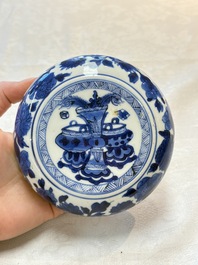 A Chinese blue and white vase, a jar and a covered box, Kangxi