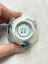 Five Chinese blue and white 'elegant beauty and boy' cups and saucers, Chenghua mark, Kangxi
