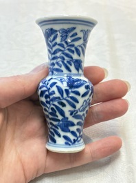 Four Chinese blue and white miniature vases, one with cover, Kangxi