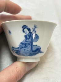 Five Chinese blue and white 'elegant beauty and boy' cups and saucers, Chenghua mark, Kangxi