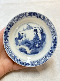 Five Chinese blue and white 'elegant beauty and boy' cups and saucers, Chenghua mark, Kangxi