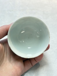 A Chinese gilt-decorated grisaille semi-erotic 'European subject' cup and saucer, Qianlong, ca. 1755