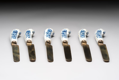 A set of six knives with Chinese gilt and blue-enamelled porcelain handles, in a case, Qianlong