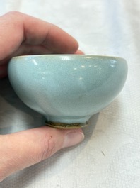 A small Chinese blue-glazed 'jun' tea cup with a wooden box, Song/Yuan