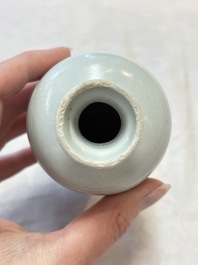 A pair of Chinese white-glazed vases and a pair of blue and white covered jars, Wanli mark and of the period