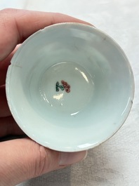 A Chinese famille rose blue-ground cup and saucer, and a 'faux-bois' cup and saucer, Yongzheng/Qianlong