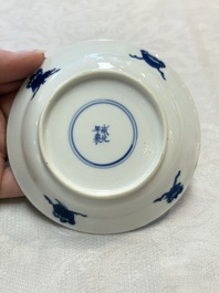 Five Chinese blue and white 'elegant beauty and boy' cups and saucers, Chenghua mark, Kangxi