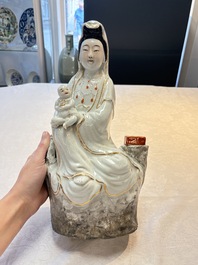A Chinese gilt- and iron-red-decorated white-glazed figure of Guanyin, Cai Yongxin 蔡永新造 mark, 20th C.