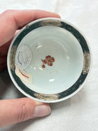 A fine Chinese famille rose 'apple pickers' cup and saucer, Yongzheng