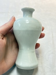 A pair of Chinese white-glazed vases and a pair of blue and white covered jars, Wanli mark and of the period
