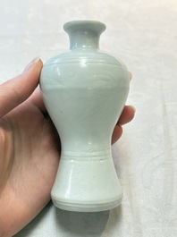 A pair of Chinese white-glazed vases and a pair of blue and white covered jars, Wanli mark and of the period