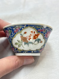 A Chinese famille rose blue-ground cup and saucer, and a 'faux-bois' cup and saucer, Yongzheng/Qianlong