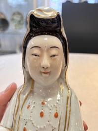A Chinese gilt- and iron-red-decorated white-glazed figure of Guanyin, Cai Yongxin 蔡永新造 mark, 20th C.