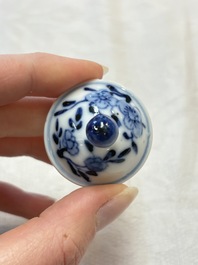 Four Chinese blue and white miniature vases, one with cover, Kangxi