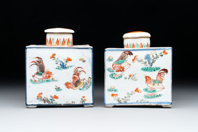 A pair of Chinese famille verte rectangular tea caddies and covers with fighting roosters, Kangxi