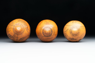 Six Chinese gourd cricket cages and seven carved gourds, 20th C.