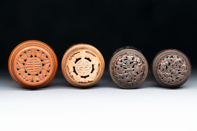 Four Chinese carved wooden cricket cages, 20th C.