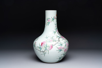A Chinese famille rose 'nine peaches' 'tianqiuping' vase, Qianlong mark, 19/20th C.