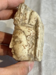 A Chinese marble head of Guanyin, Tang